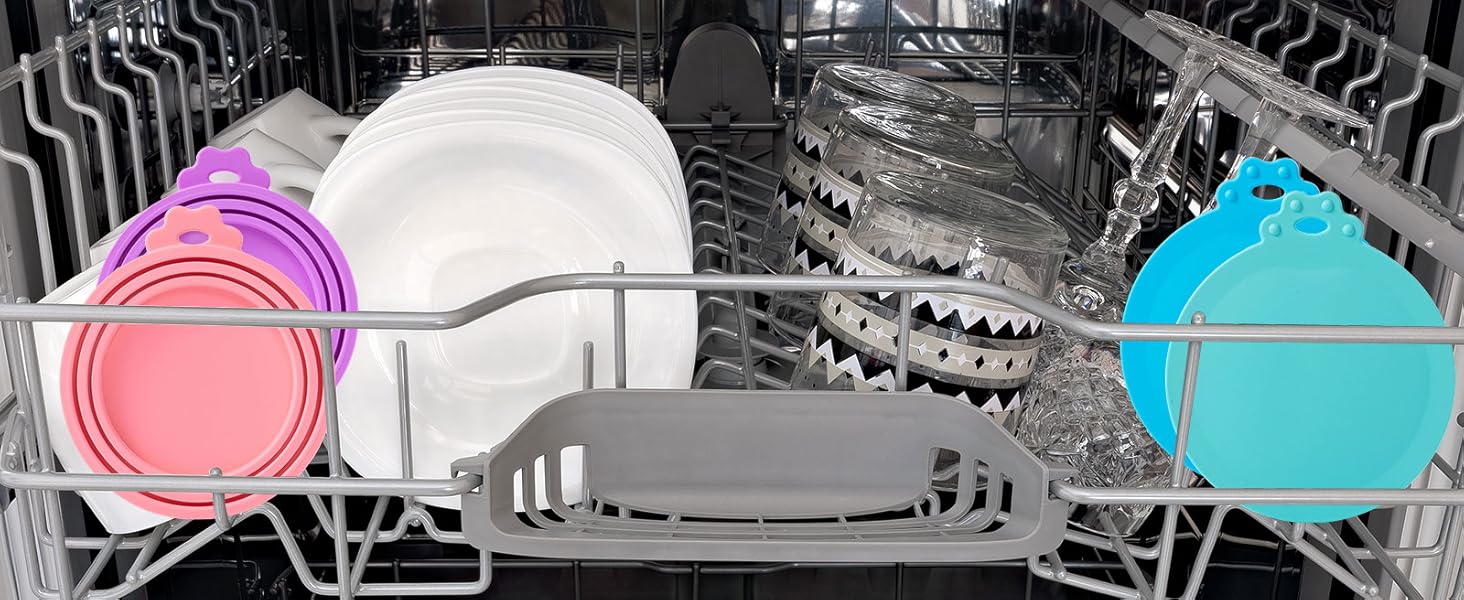 Interior view of a dishwasher with plates, utensils, and dishes arranged on racks, highlighted with pink and blue overlay markers showing loading zones.
